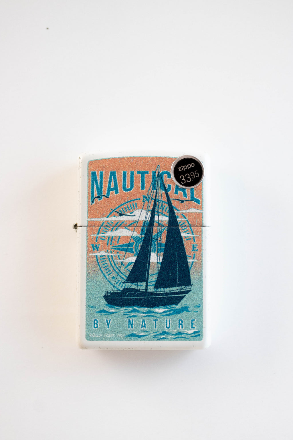 Zippo lighter featuring sailboat nautical design on matte finish