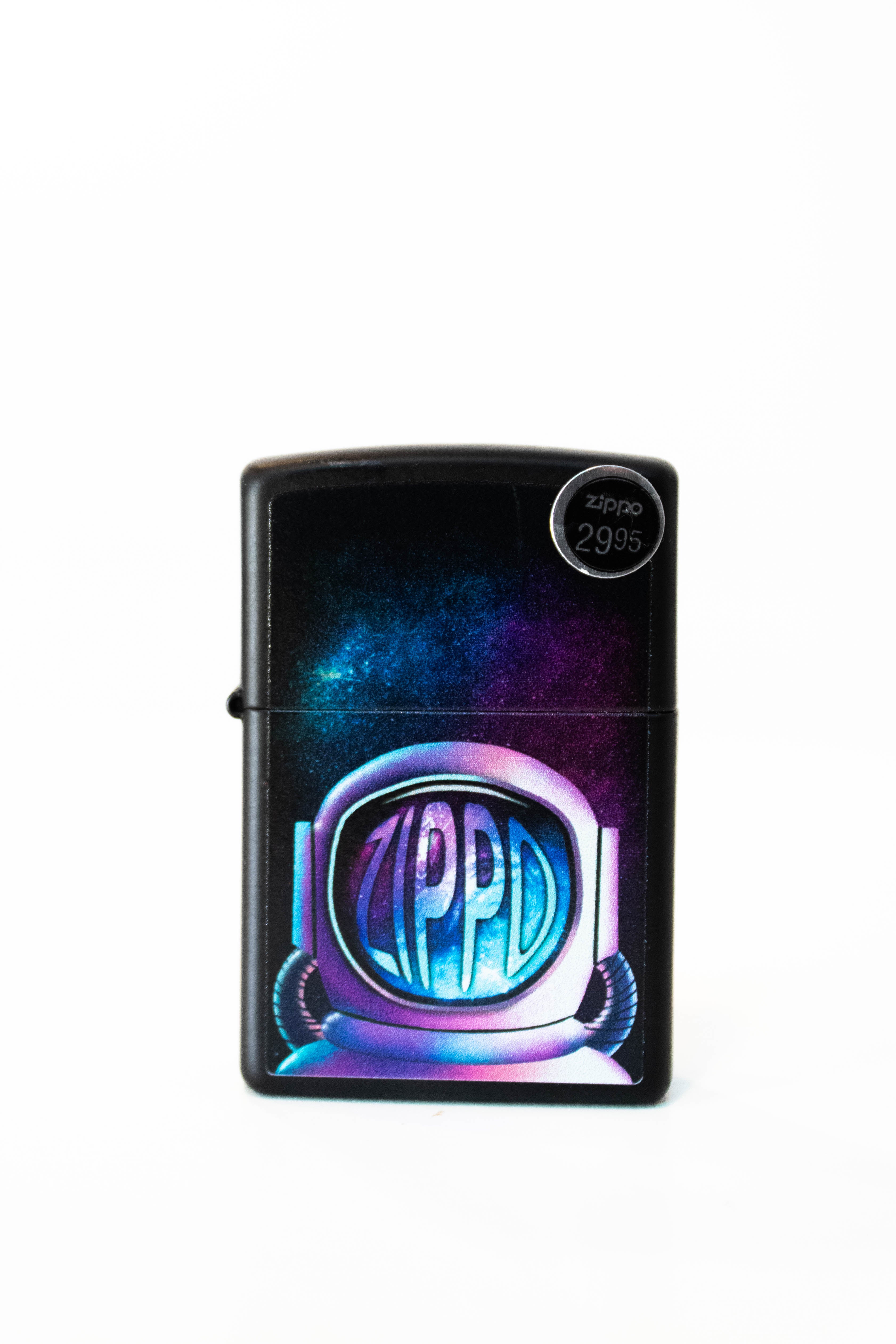 Zippo lighter featuring astronaut themed Zippo artwork