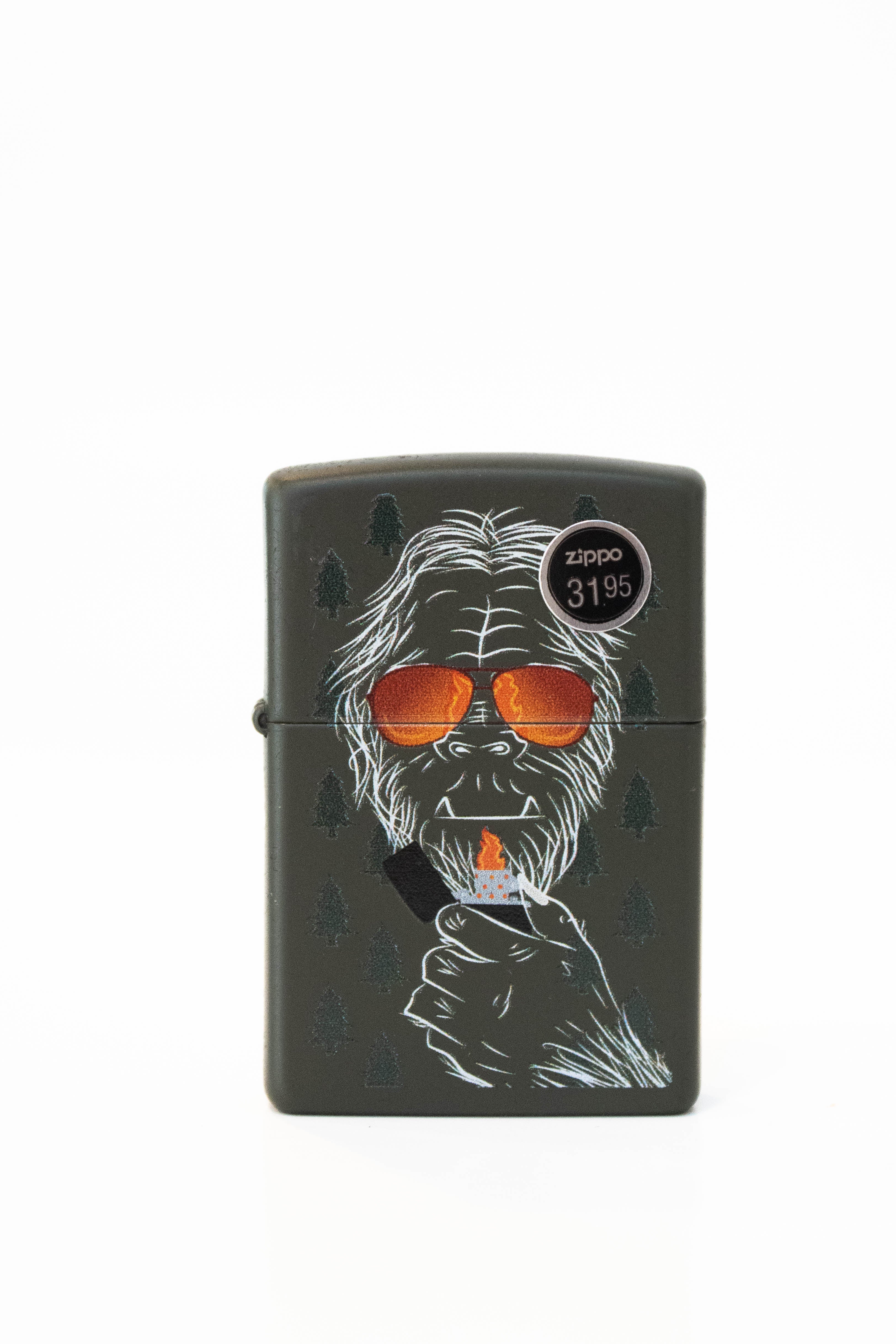 Zippo lighter featuring Zipsquatch artwork on green matte finish