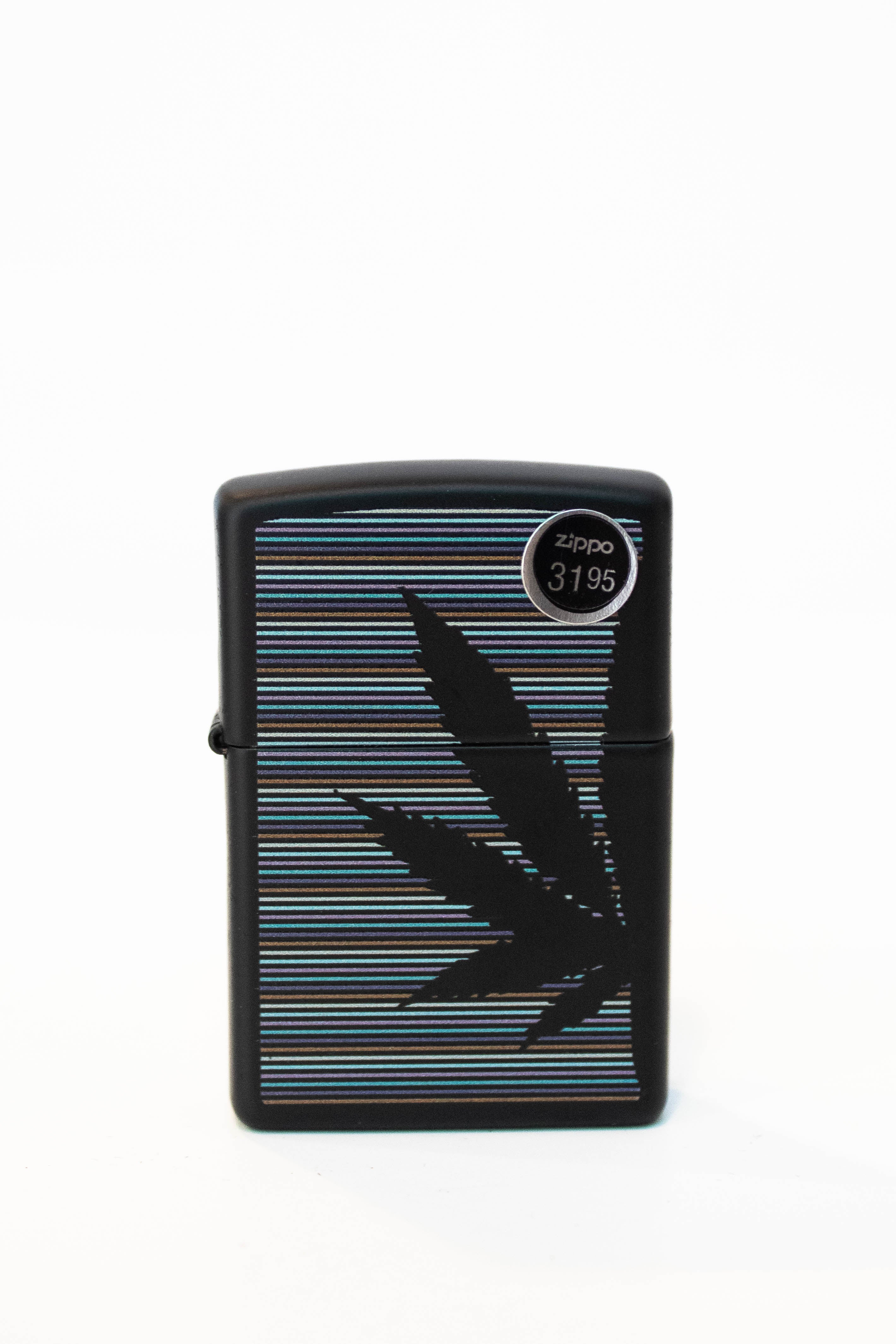 Zippo lighter with line art cannabis leaf illustration