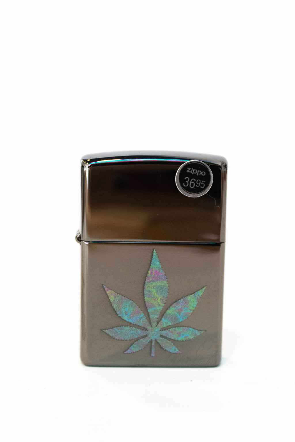 Zippo lighter featuring colorful cannabis leaf artwork