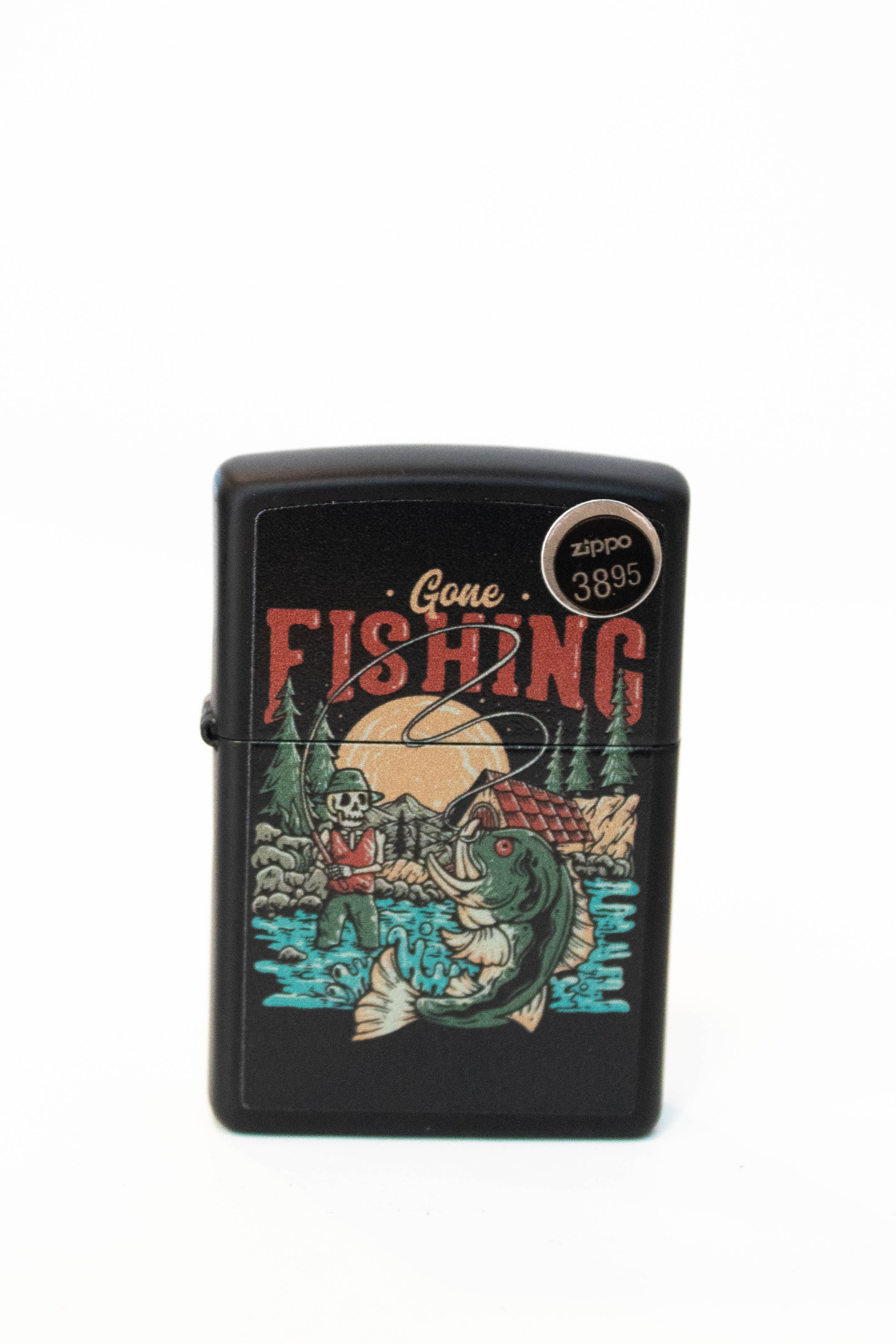 Zippo lighter with skull and fishing themed Gone Fishing design