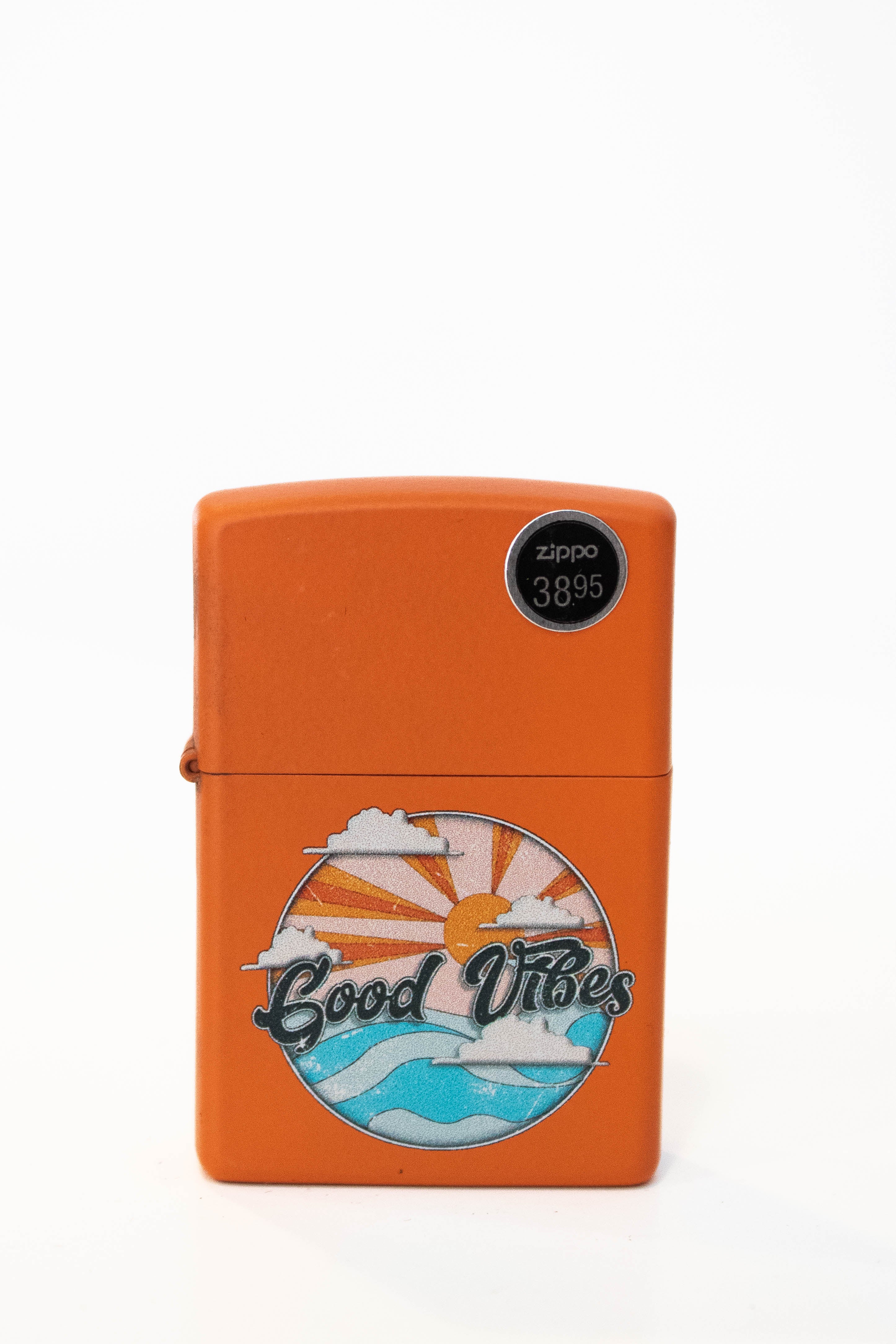 Zippo lighter featuring Good Vibes themed artwork