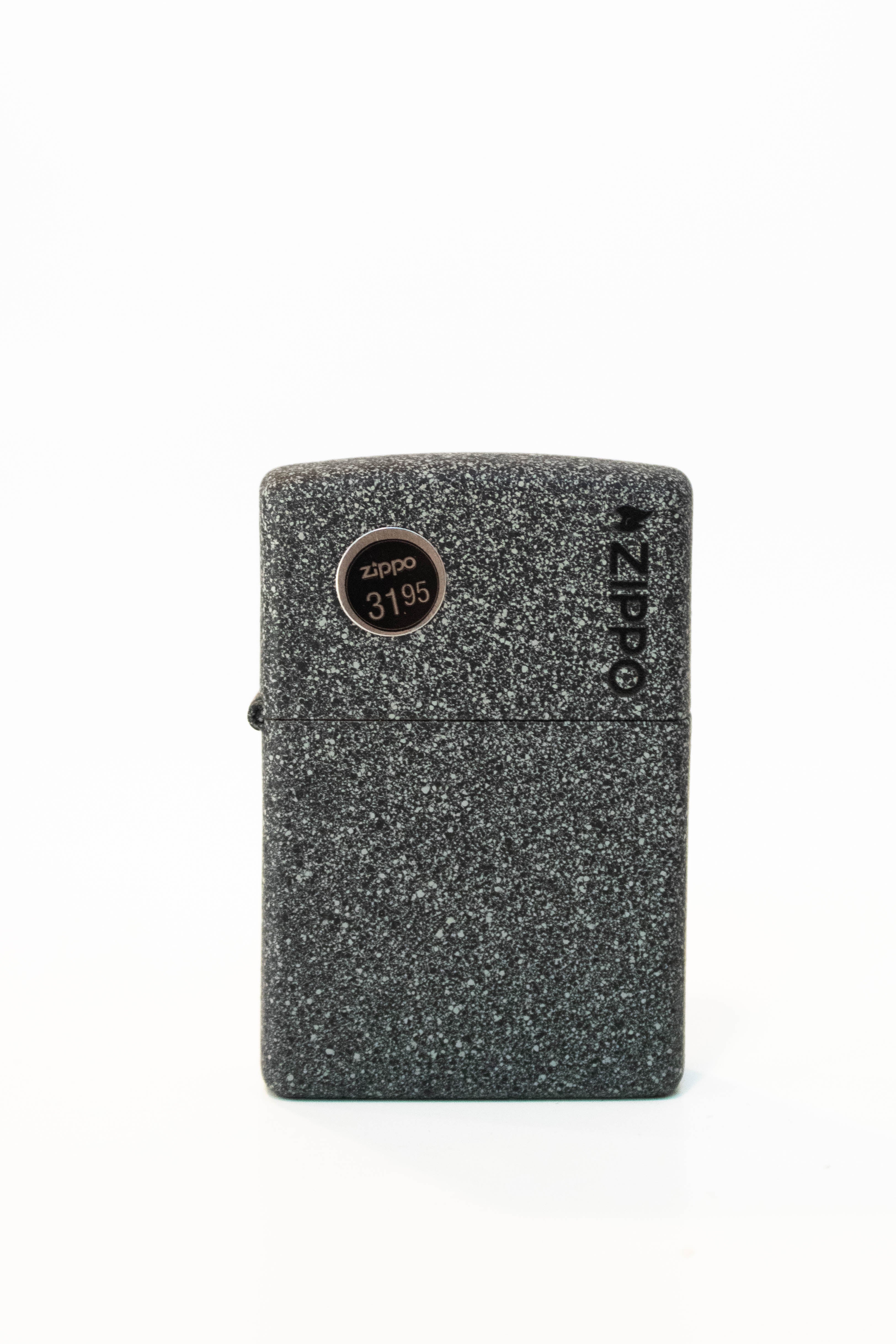 Zippo lighter featuring iron stone texture with Zippo logo